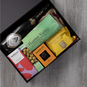 Sparkling wine, gourmet popcorn, artisanal chocolate, hand-roasted macadamias, plus a watercolour-illustrated map cotton tea towel of the Hunter Valley and matching greeting card in a gift hamper with free delivery