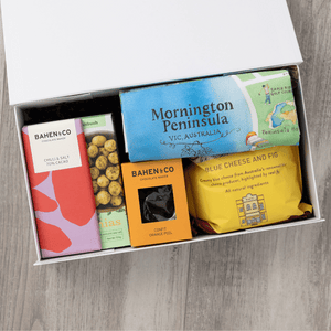 Gourmet popcorn, artisanal chocolate, hand-roasted macadamias, plus a watercolour-illustrated map cotton tea towel of the Mornington Peninsula and matching greeting card in a gift hamper with free delivery