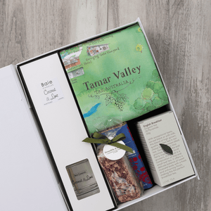 Chocolate, coconut and lime reed diffuser, gourmet nougat, English breakfast tea bags, plus a watercolour-illustrated map cotton tea towel of the Tamar Valley and matching greeting card in a gift hamper with free delivery