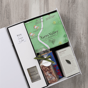 Chocolate, coconut and lime reed diffuser, gourmet nougat, English breakfast tea bags, plus a watercolour-illustrated map cotton tea towel of the Yarra Valley and matching greeting card in a gift hamper with free delivery