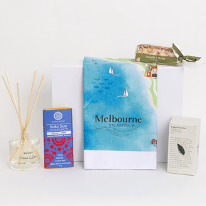 Chocolate, coconut and lime reed diffuser, gourmet nougat, English breakfast tea bags and your choice of one of 18 Australian map tea towels gift hamper